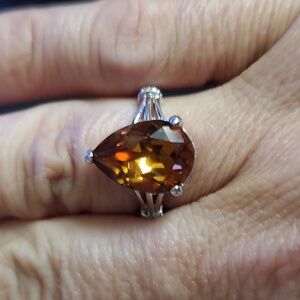 STERLING SWAROVSKI SILVER WITH AMBER COLORED STONE SZ 8